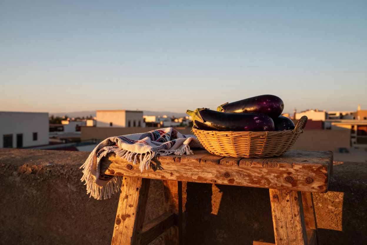 Sunset in Essaouira Morocco Linen Fringe and Eggplants on Traditional Wooden Stool in in Essaouira, Morocco