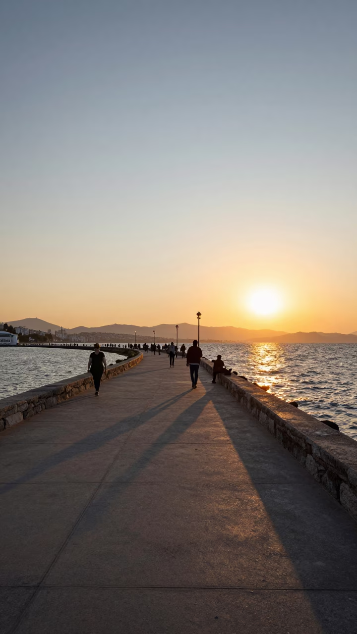 Sunset in Izmir Turkey View of Kordon Promenade and Aegean Sea with Urban Life in in Izmir, Turkey