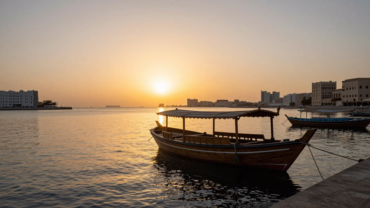 Sunset in Muscat Oman Traditional Dhow Boat Near Mutrah Corniche with Local Life in in Muscat, Oman
