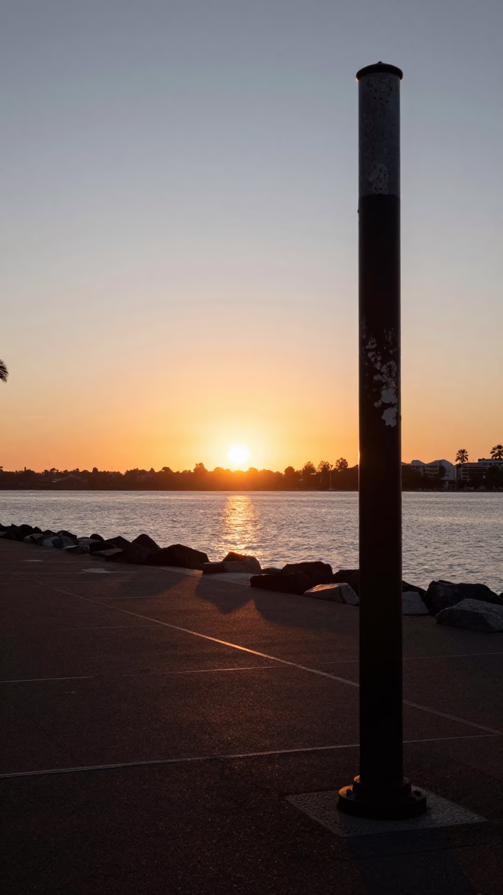 Sunset in Perth at As The Sun Drops Toward The Horizon in in Perth, Western Australia, Australia
