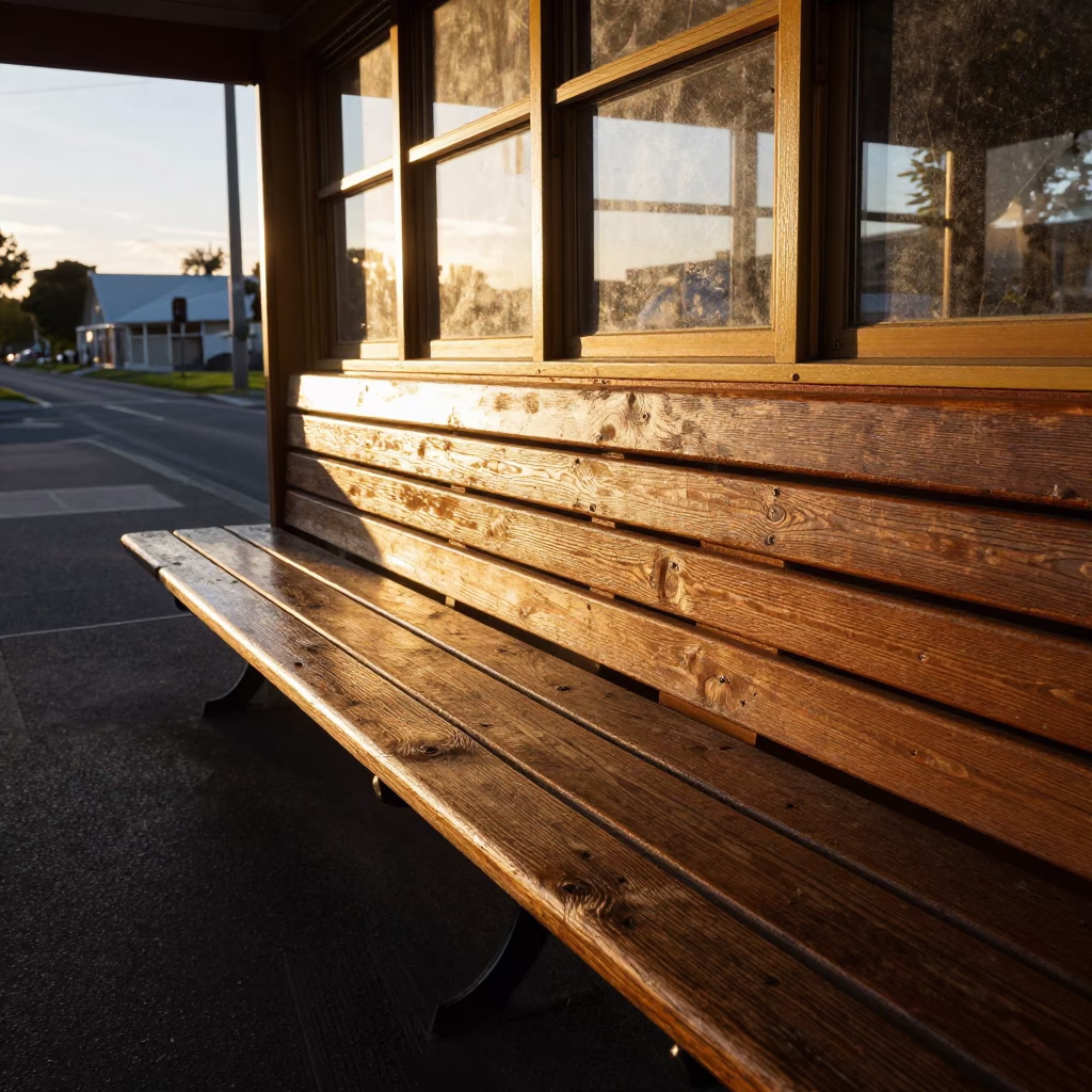 Sunset light on Christchurch tramway bench slat near Avon River in in Christchurch, New Zealand