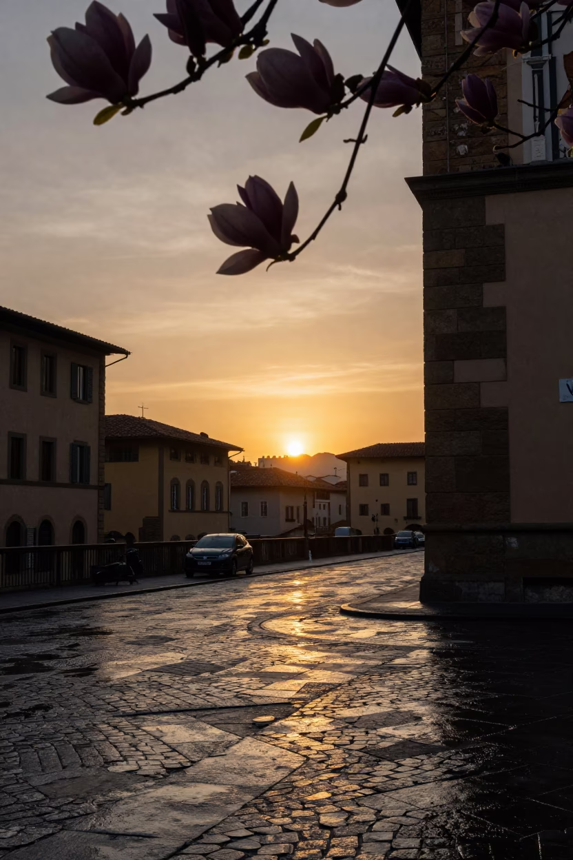 Sunset light on Florence street corner with magnolia bloom and brass railing in in Florence, Italy