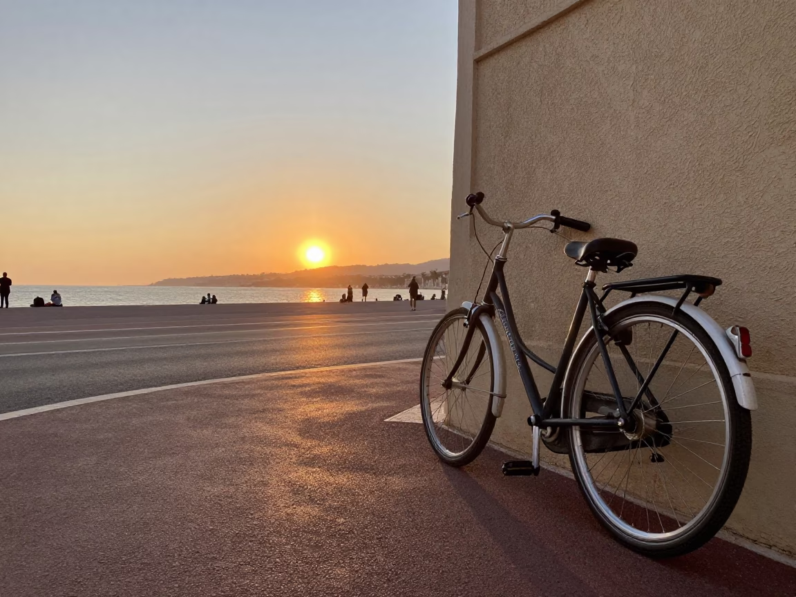 Sunset Light on Nice French Riviera Street with Bicycle and Window Reflection in in Nice, France