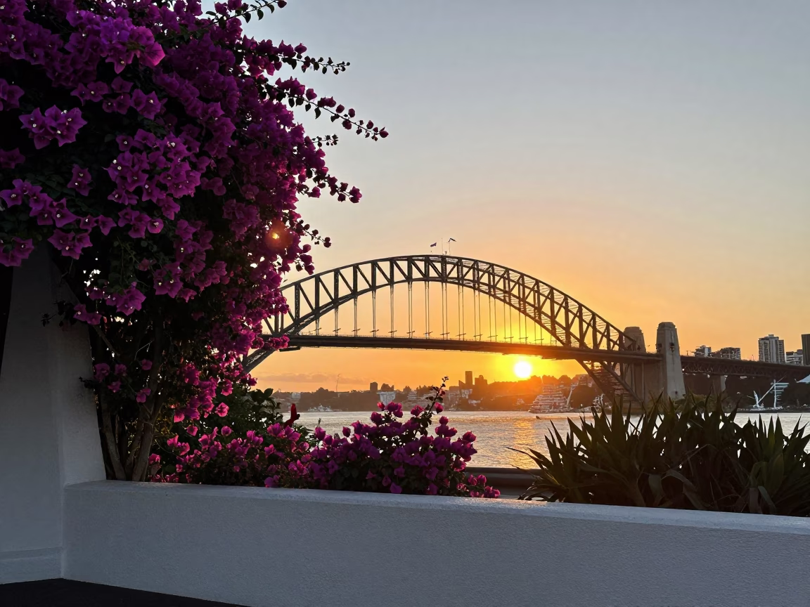Sunset Over Auckland Harbour Bridge With Bougainvillea Cascade and Commuter Traffic in in Auckland, New Zealand