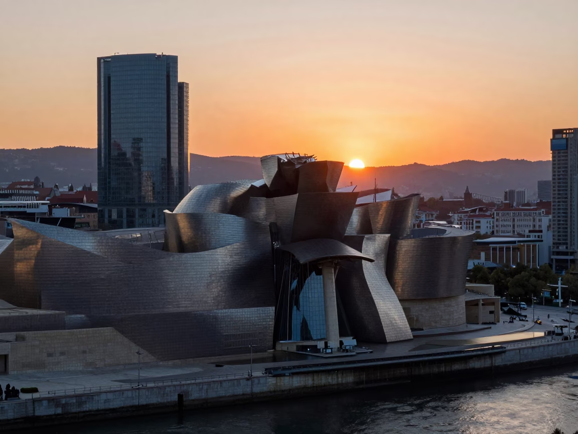 Sunset over Bilbao Spain Guggenheim Museum and Nervion River Aerial Tramway in in Bilbao, Spain