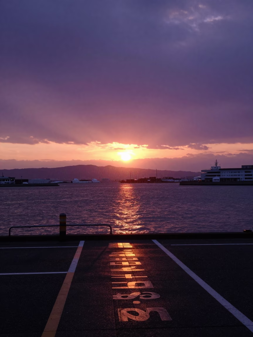Sunset over Fukuoka Harbor with Drawbridge Deck Markings Shining Under Harbor Drizzle in in Fukuoka, Japan
