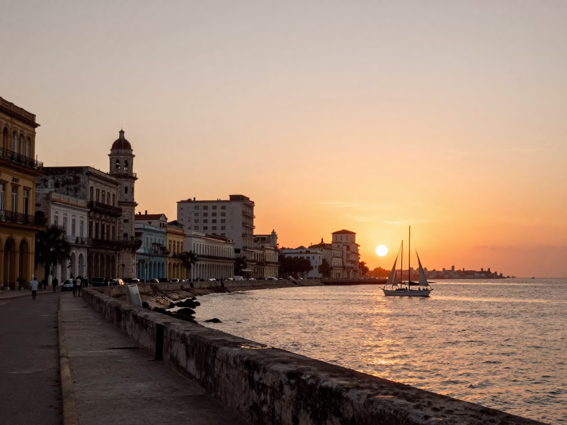 Sunset Over Havana Harbor With Sailboat and Colonial Architecture in in Havana, Cuba