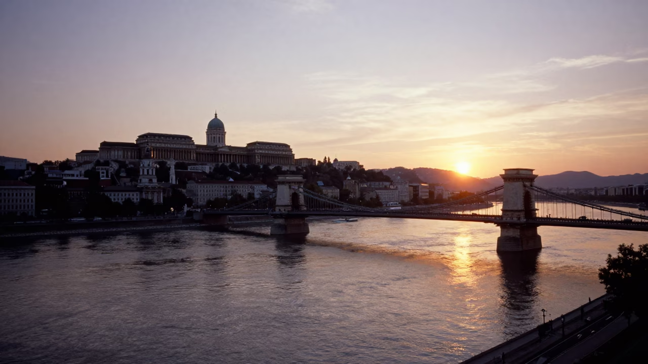 Sunset over the Danube River in Budapest Hungary with Buda Castle and Chain Bridge in in Budapest, Hungary