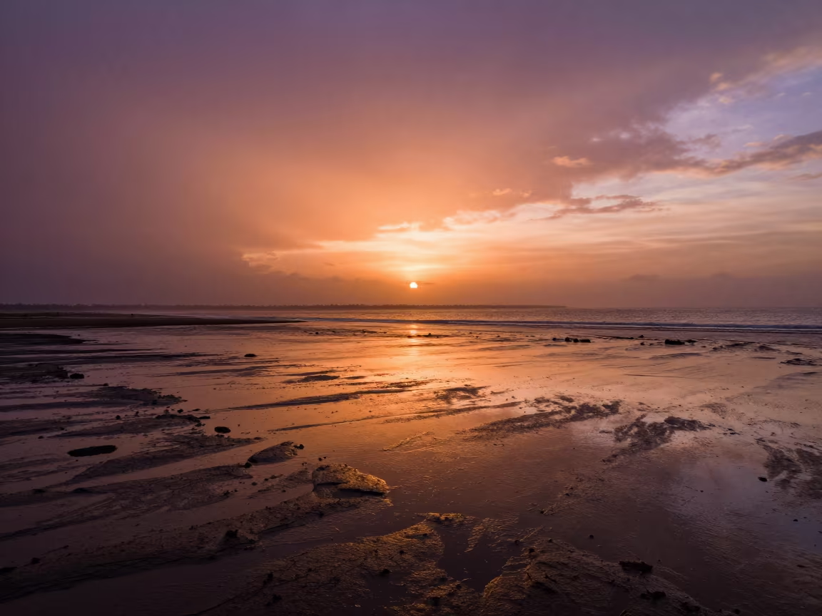 Sunset Reflections on Wet Serengeti Tidal Flats in along a wave-cut shoreline in the Serengeti