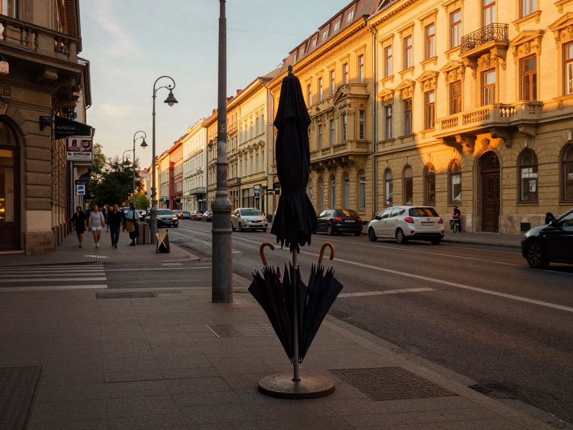 Sunset Street Scene in Budapest Hungary with Umbrella Stand and Local Activity in in Budapest, Hungary