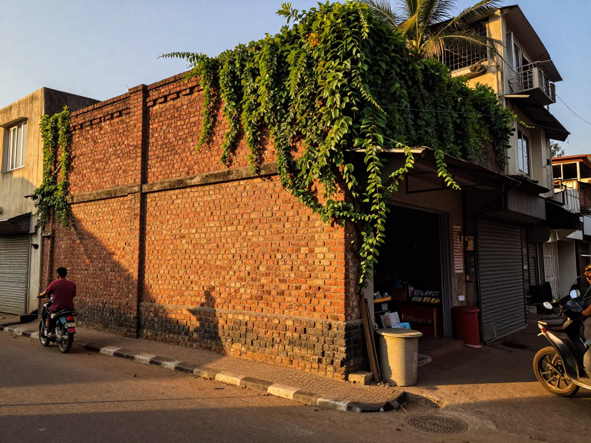 Sunset Street Scene in Hyderabad India with Brick Wall and Daily Life in in Hyderabad, India