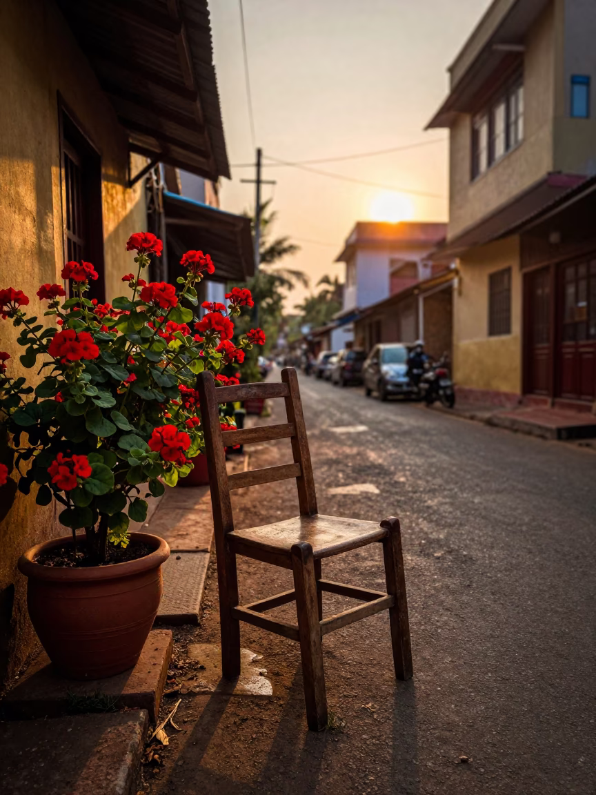 Sunset Street Scene in Kochi India with Ladder Back Chair and Geraniums in in Kochi, India
