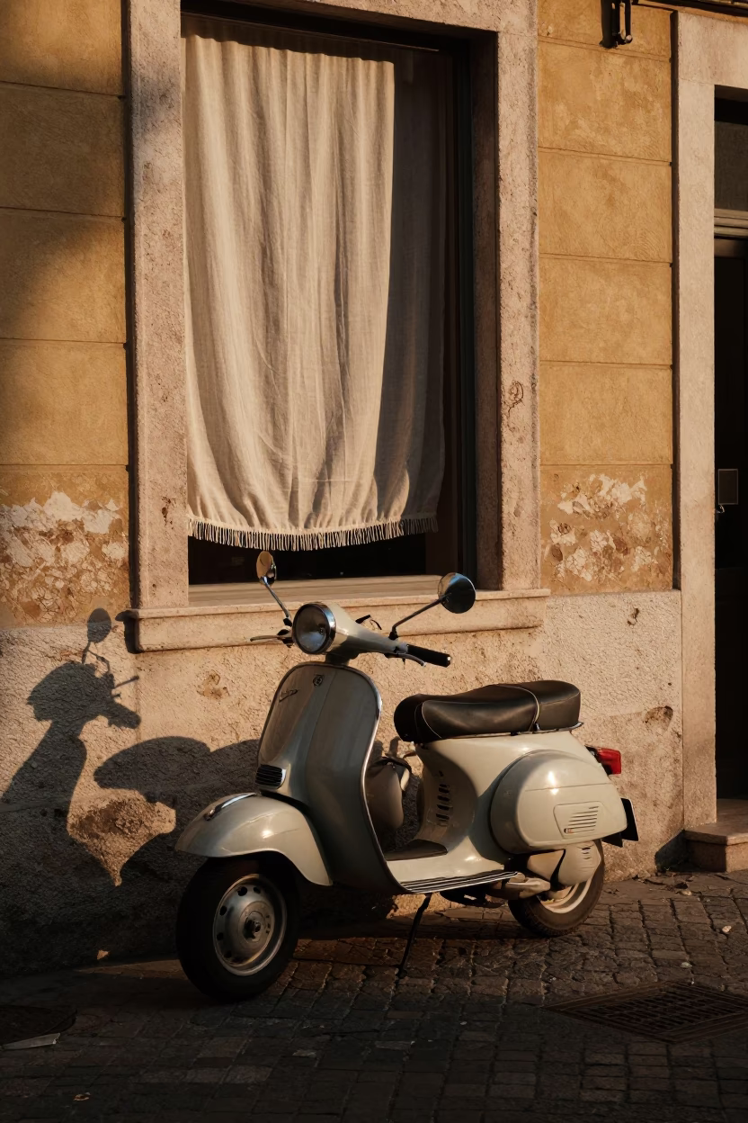 Sunset street scene in Nice France with vintage scooter and linen curtains in in Nice, France