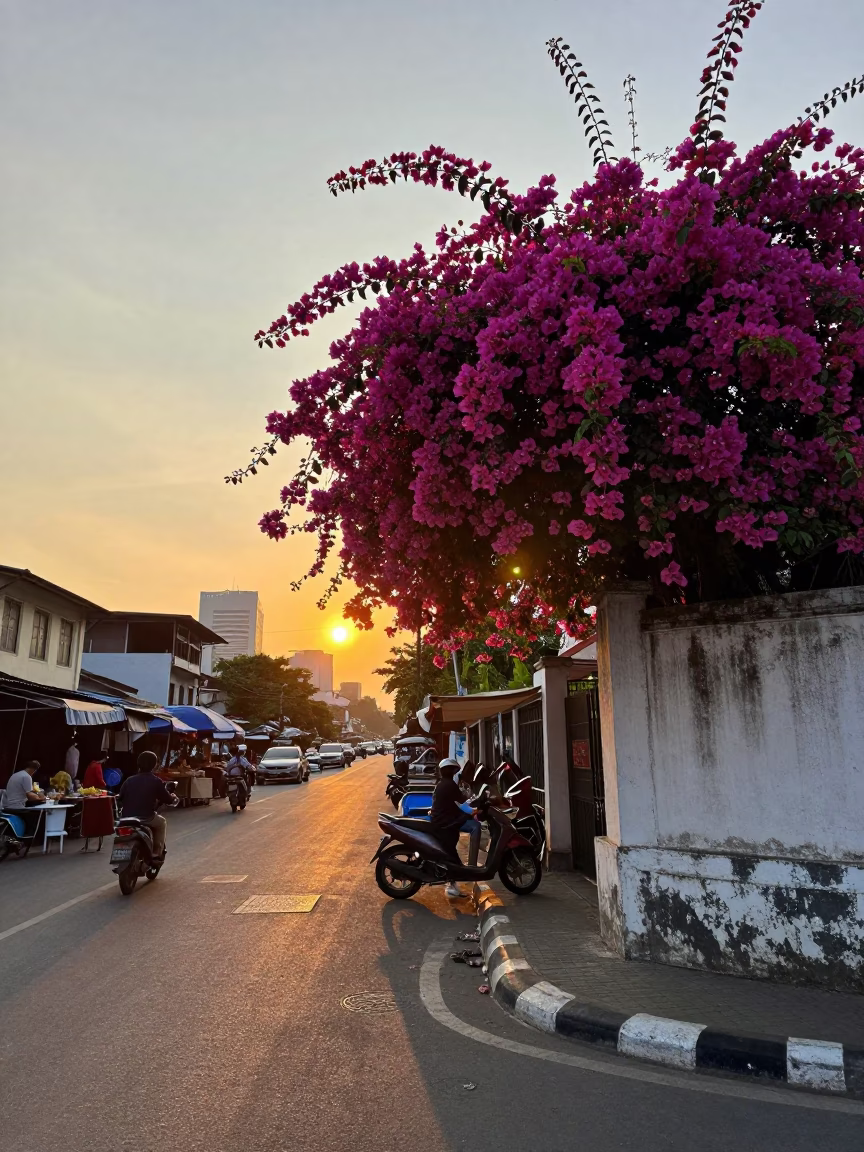 Sunset Street Scene in Surabaya Indonesia with Bougainvillea and Local Market Activity in in Surabaya, Indonesia