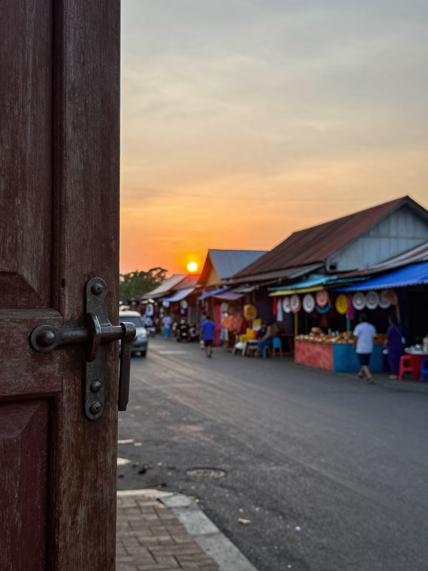 Sunset Street Scene in Surabaya Indonesia with Vintage Latch and Plate in in Surabaya, Indonesia