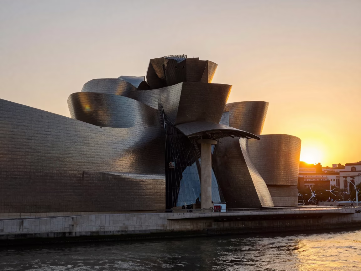 Sunset View of Guggenheim Museum Bilbao with Art Museum and Nervion River in in Bilbao, Spain