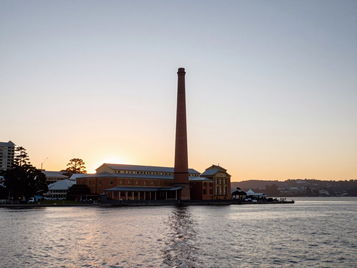 Sunset View of Hobart Waterfront and Cascade Brewery Chimney in in Hobart, Tasmania, Australia