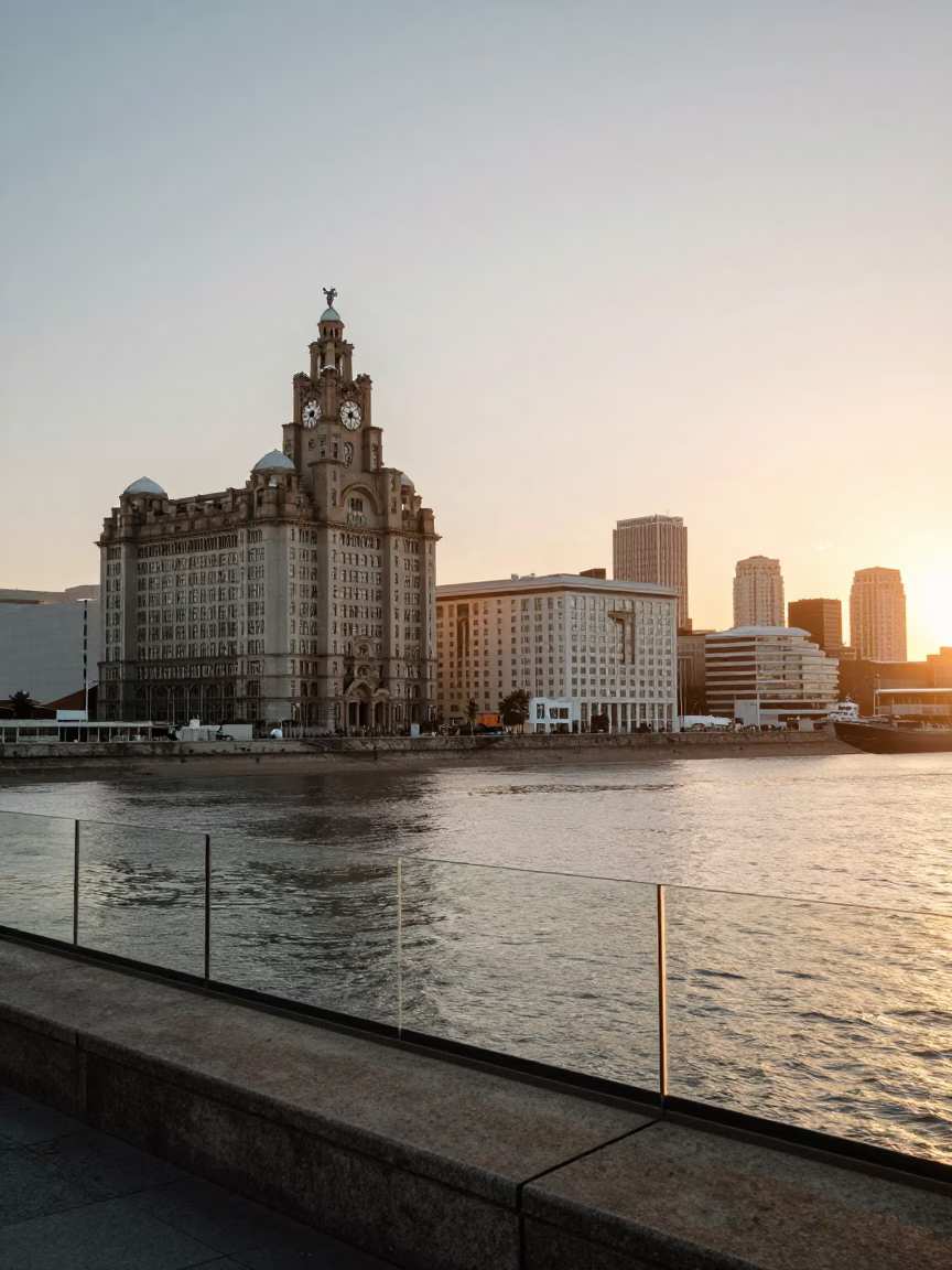 Sunset View of Liverpool Waterfront with Clear Glass Sill Edge and Historic Architecture in in Liverpool, United Kingdom