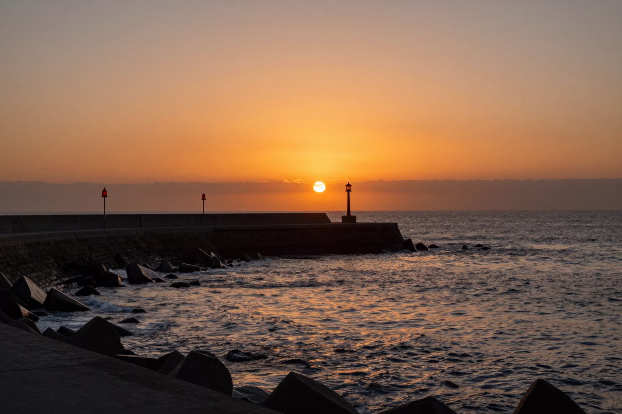 Sunset View of Valparaiso Chile Coastal Breakwater with Warning Beacons in in Valparaiso, Chile