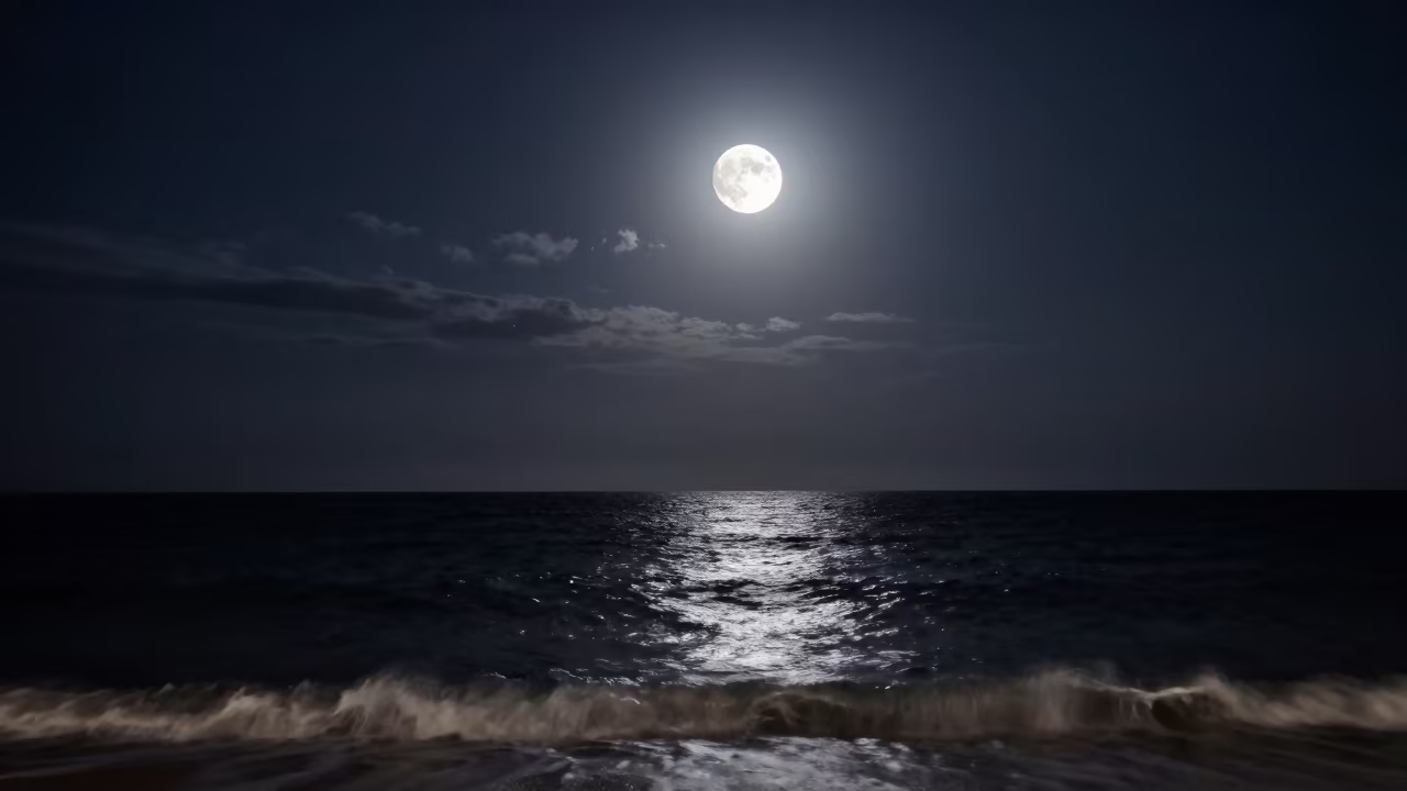 Supermoon Over Winter Greek Ocean Waves in beneath thin cloud gaps and stars in Greece