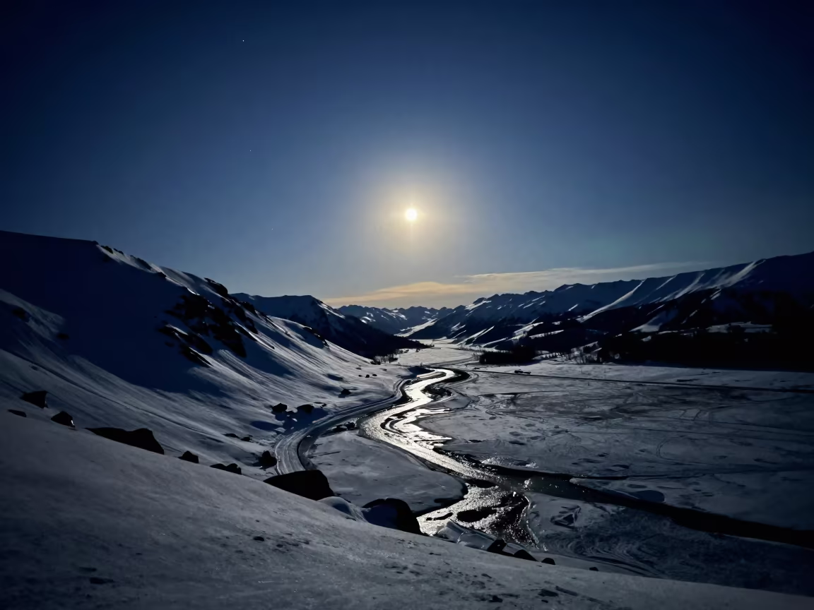 Supermoon over Snowy Alpine Pass Near Anchorage in under the clearest stretch of sky near Anchorage
