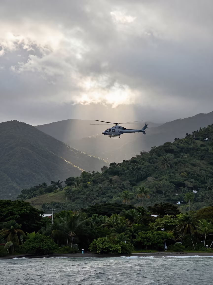 Supply Helicopter Hovering Over Mountains Near Les Cayes in across a remote ferry crossing near Les Cayes