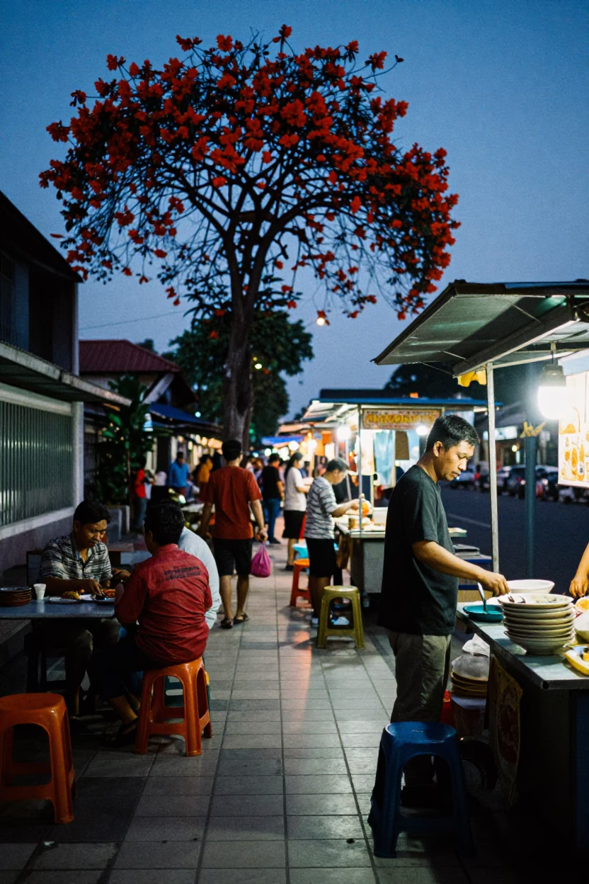 Surabaya Indonesia Blue Hour Street Scene with Flame Tree and Tiled Floor Shadows in in Surabaya, Indonesia
