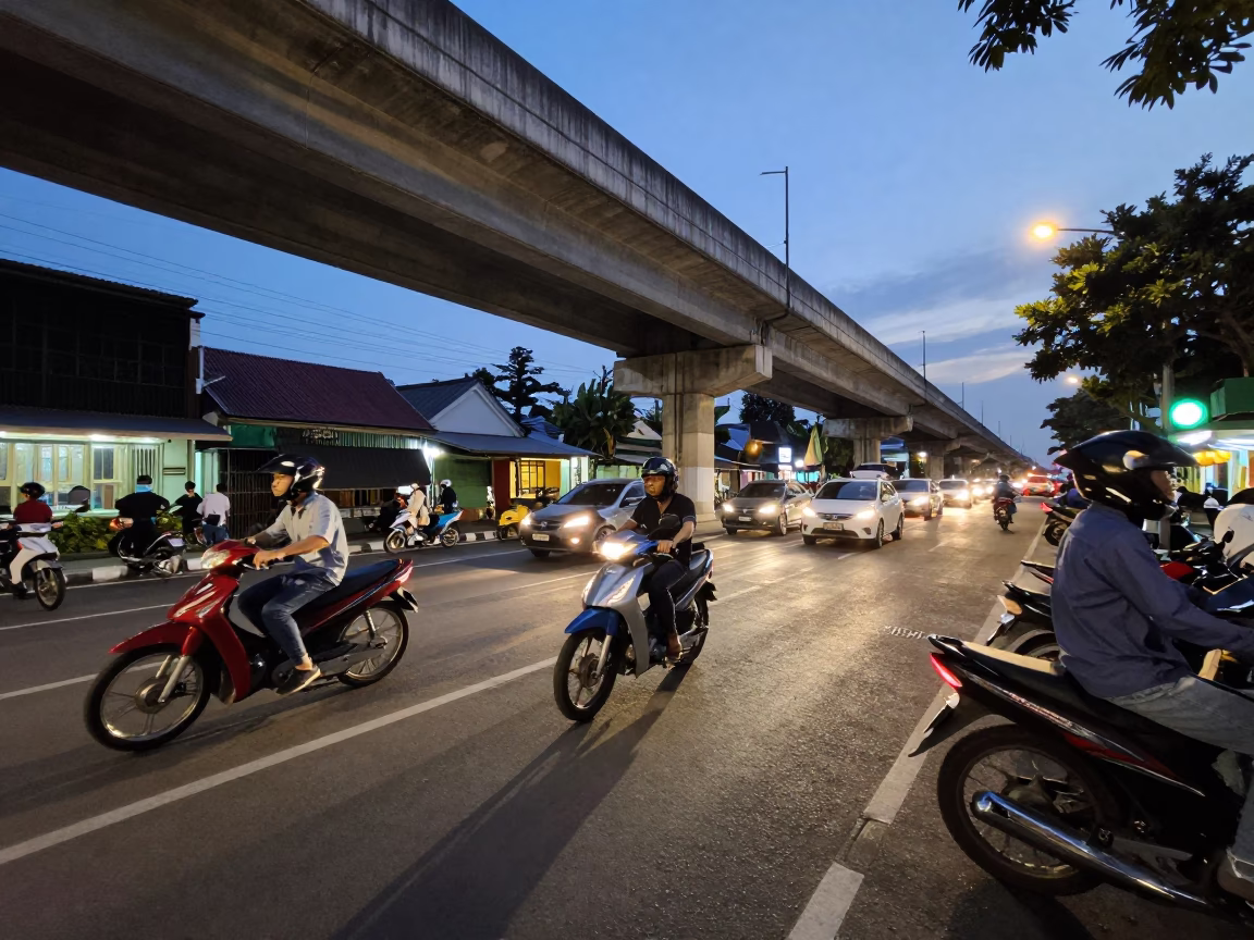 Surabaya Indonesia Early Evening Street Scene with Motorbikes and Local Market Activity in in Surabaya, Indonesia