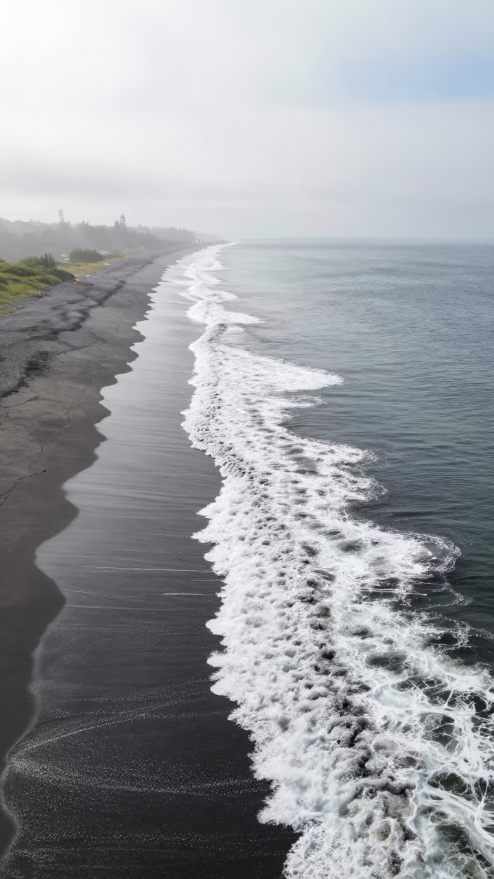 Surf Lines Strike Black Sand Coastline Near Campo Grande in near Campo Grande