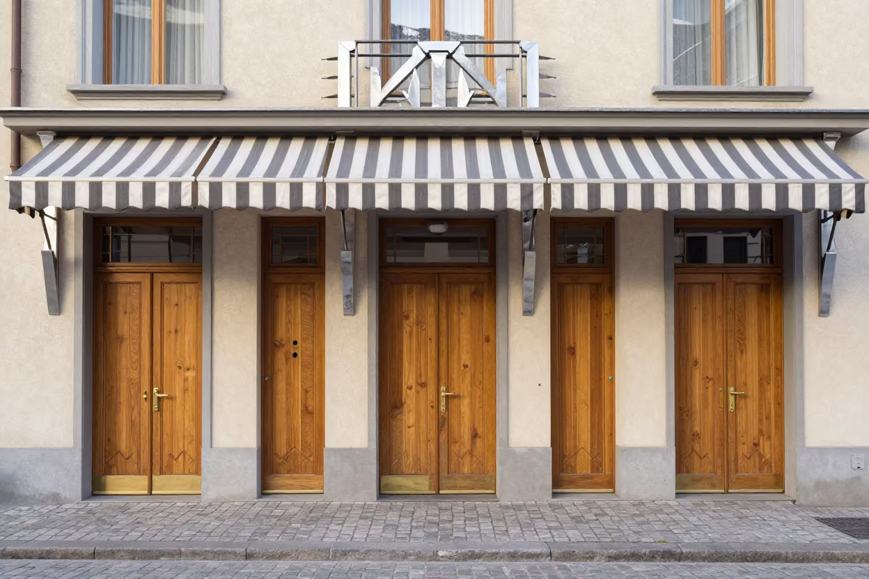 Surreal Art Deco Hotel Corridor Lausanne in beneath hotel awnings at the curb in Lausanne