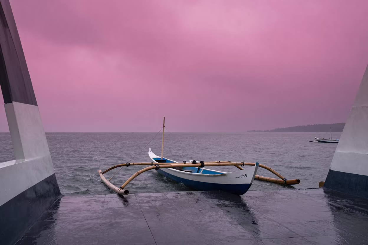 Surreal Magenta Sky Over Indonesian Ferry Prau in across a remote ferry crossing near Yogyakarta