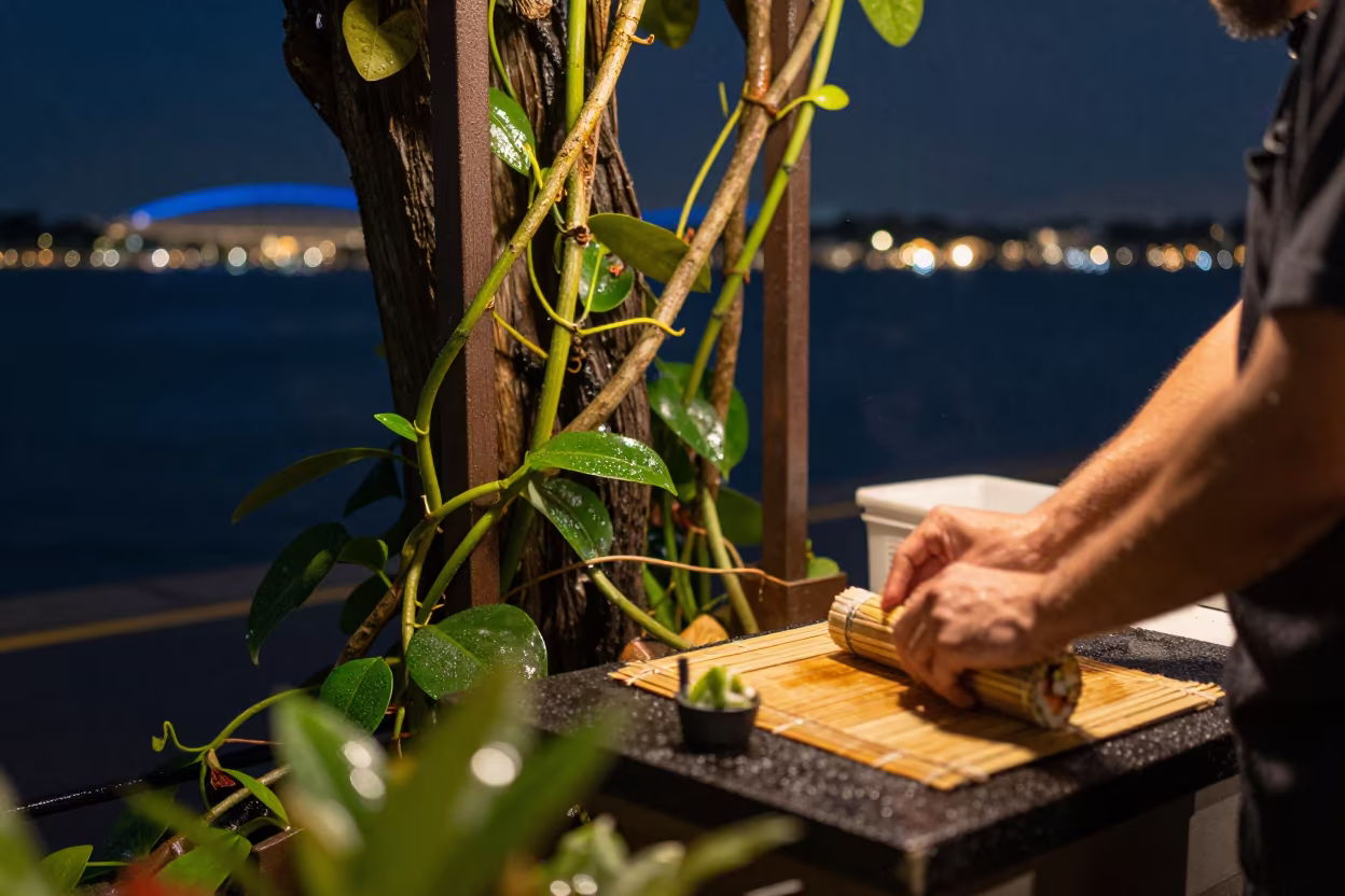 Sushi Rolling Amidst Jungle Vines Singapore Harbor Night in at a harbor edge in Singapore
