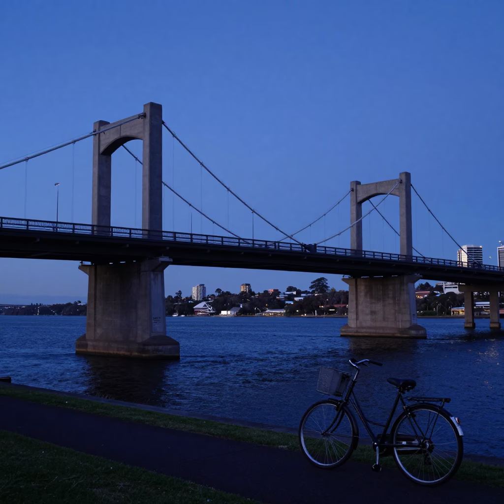 Swan River Bridge Piers And Vintage Bicycle at Twilight in Perth in in Perth, Western Australia, Australia