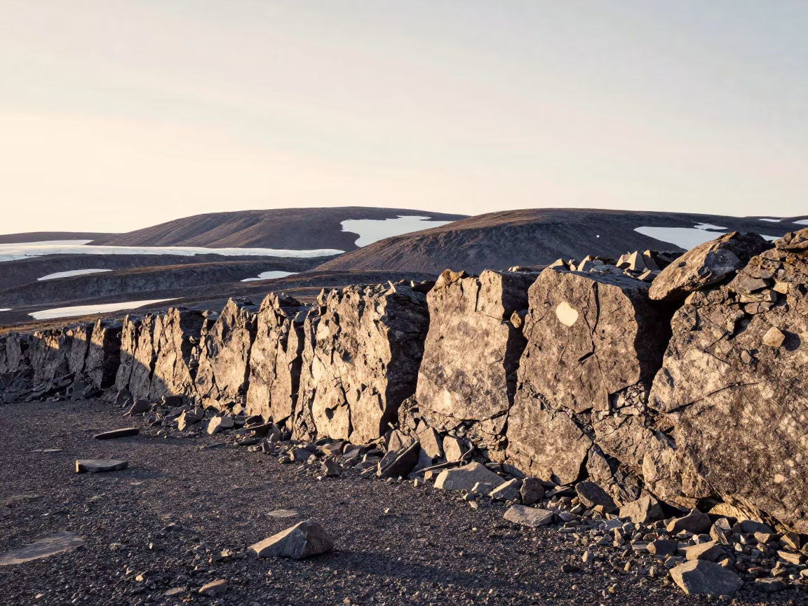 Swedish Moraine Wall Under Midnight Sun in from a ridge above layered foothills in Sweden