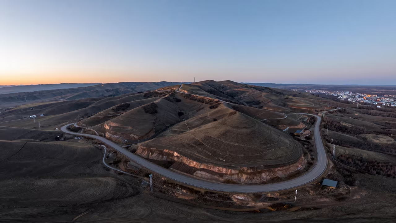 Switchback Roads Climbing Copper Hills Far East in far above terraced hillsides in the Russian Far East