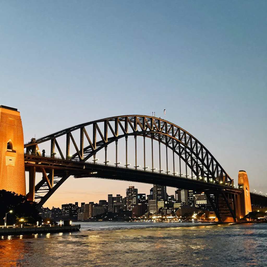 Sydney Bridge Illuminated at As City Lights Begin To Glow in in Sydney, New South Wales, Australia