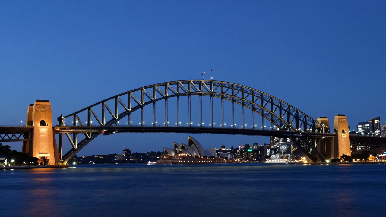 Sydney Harbour Bridge and Opera House at Blue Hour with City Lights Reflections in in Sydney, New South Wales, Australia