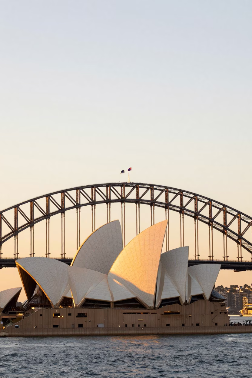Sydney Harbour Bridge and Opera House at Sunrise with Jacaranda Trees in Bloom in in Sydney, New South Wales, Australia