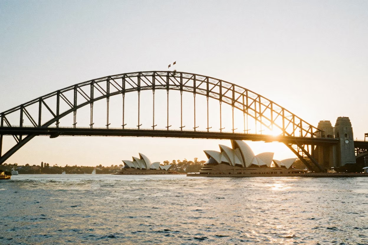 Sydney Harbour Bridge and Opera House at Sunrise with Morning Mist in in Sydney, New South Wales, Australia