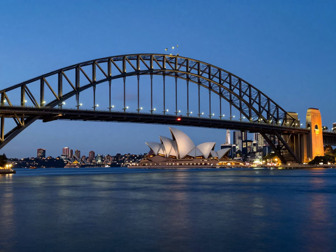 Sydney Harbour Bridge and Opera House at Twilight with Pedestrians on the Quay in in Sydney, New South Wales, Australia