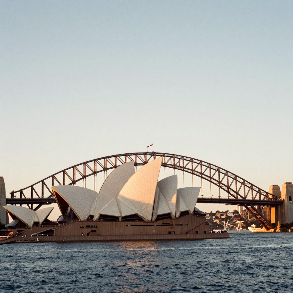 Sydney Harbour Bridge and Opera House in Honeyed Evening Light with Busy Urban Activity in in Sydney, New South Wales, Australia