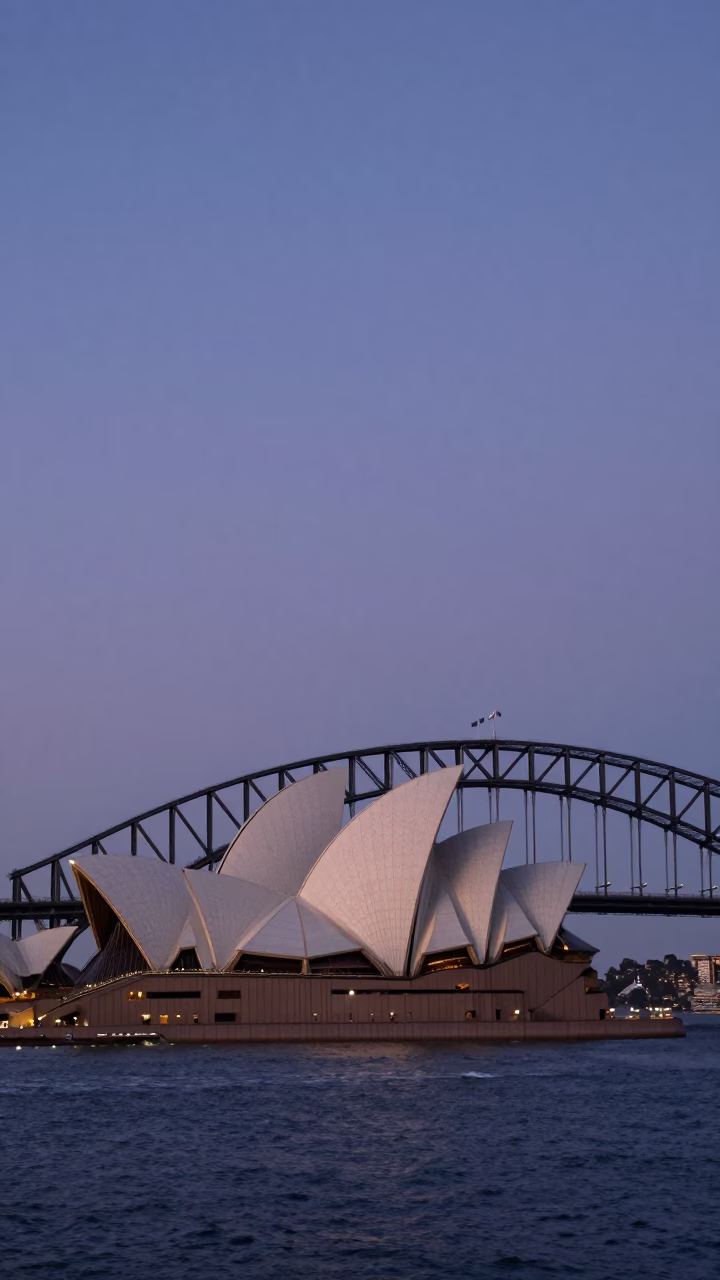 Sydney Harbour Bridge and Opera House in Indigo Twilight with City Lights in in Sydney, New South Wales, Australia
