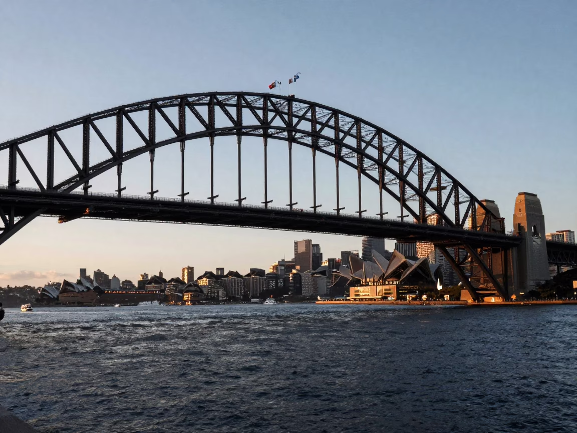 Sydney Harbour Bridge at Dawn with Morning Commuters and City Skyline in in Sydney, New South Wales, Australia