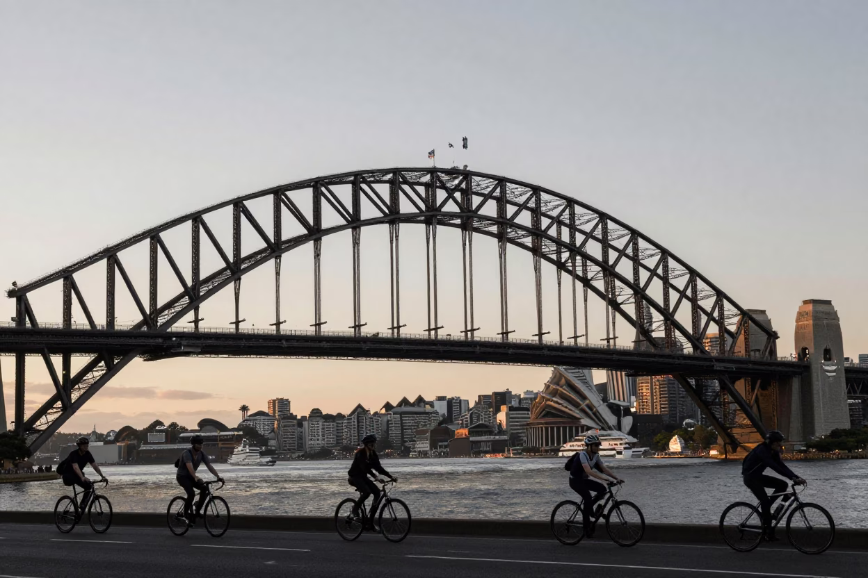 Sydney Harbour Bridge at Nautical Dawn with Commuter Cyclists and Urban Morning Mist in in Sydney, New South Wales, Australia