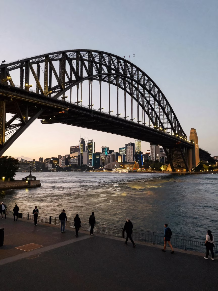 Sydney Harbour Bridge evening light with commuters and city skyline in in Sydney, New South Wales, Australia