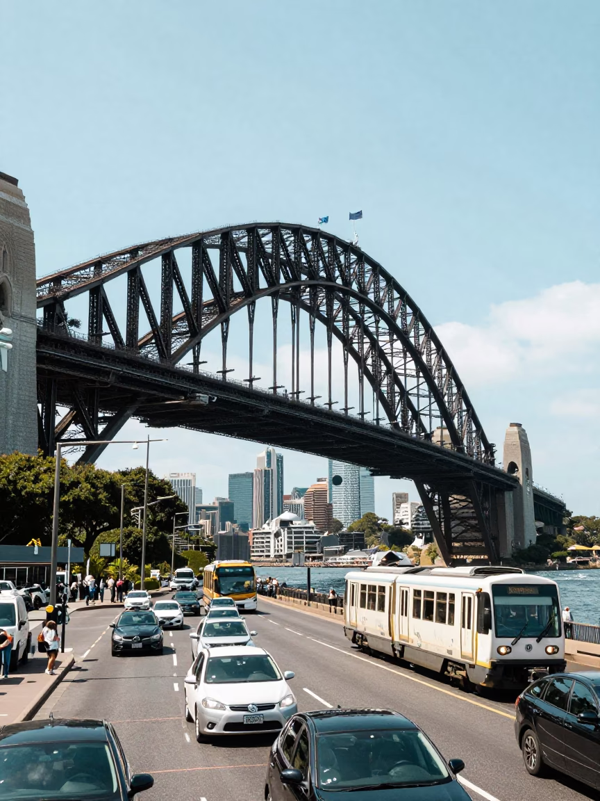 Sydney Harbour Bridge steel arches and busy traffic under bright midmorning sunlight in in Sydney, New South Wales, Australia