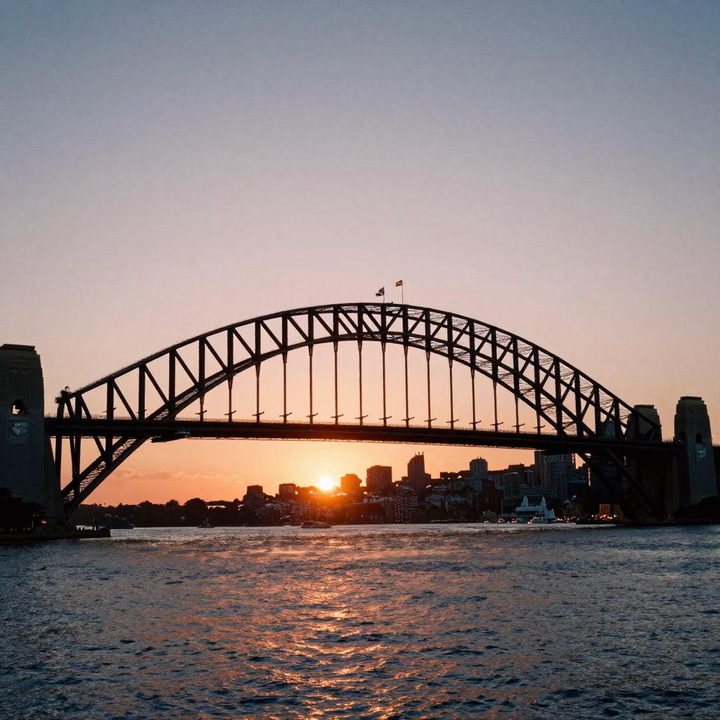Sydney Harbour Bridge Sunset View from Circular Quay with Commuters and Urban Skyline in in Sydney, New South Wales, Australia