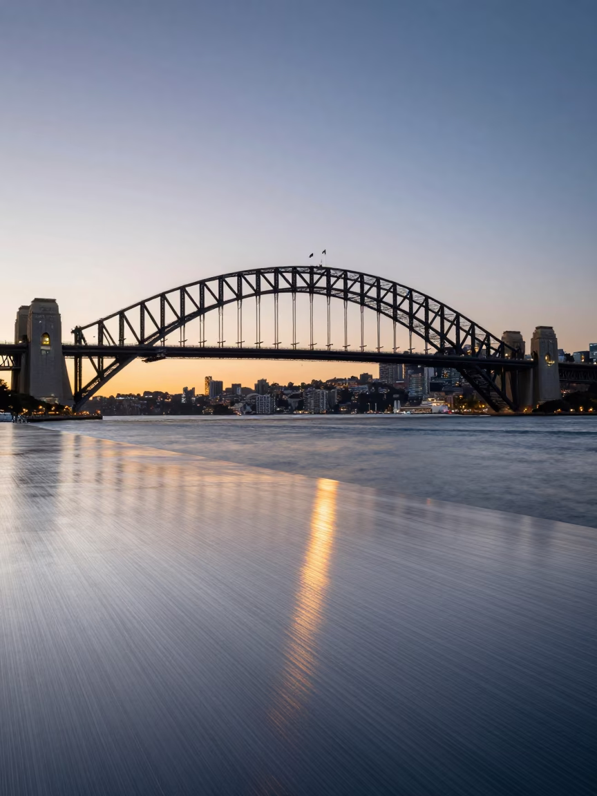 Sydney Harbour Dawn Light Reflects on Brushed Steel Surface Near Harbour Bridge in in Sydney, New South Wales, Australia
