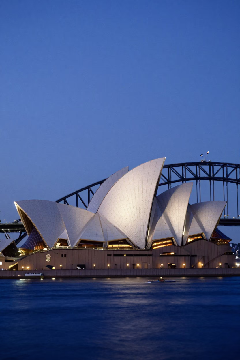 Sydney Opera House and Harbour Bridge in Indigo Twilight with City Lights in in Sydney, New South Wales, Australia