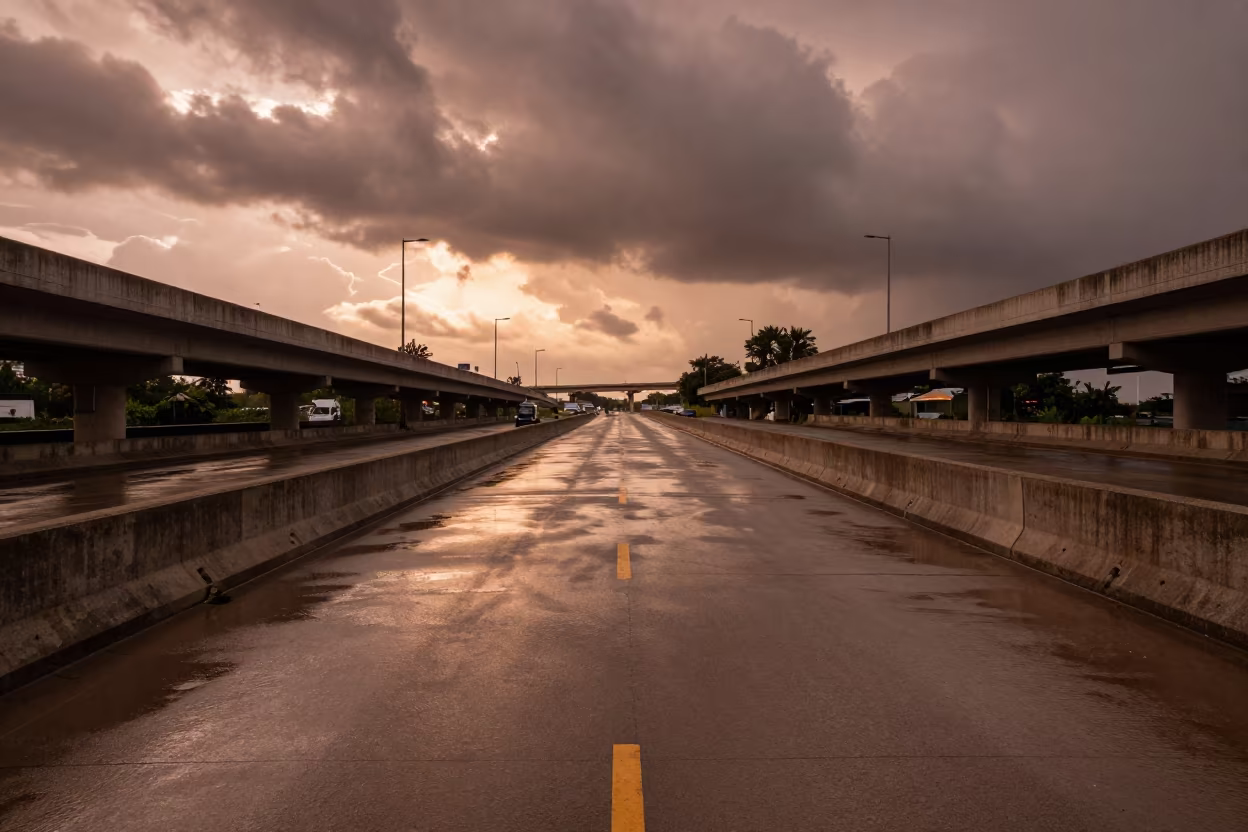Symmetrical Levee Road After Monsoon Storm in across a windy overpass interchange near Akola